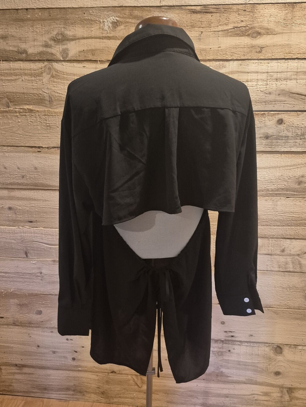 5/$50. Classic White Button-Up Shirt featuring a dramatic open-back design